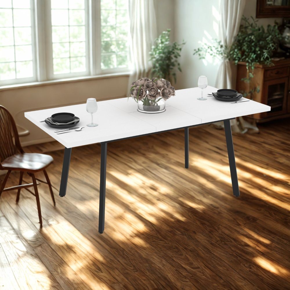 Tavolo allungabile Lini piano rovere o bianco e gambe in metallo nero